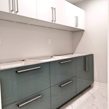 Gallery wall (8ft) laundry room. L - shape kitchen (10 ft by 10 ft)
