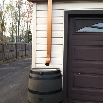 Gutter going into a rain barrel