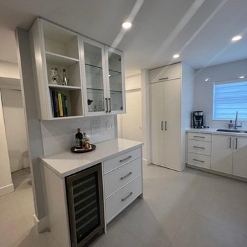 Transitional Kitchen Remodel Done in a Satin White Slim Shaker Door