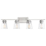 Savoy House - Calhoun Vanity Fixture, Satin Nickel, 4-Light - Brighten up your bath with the sleek and contemporary look of the Calhoun bath bar. The fixture's frame has a rectangular wall plate, bold-lined light bar, and chunky, cylindrical bulb sockets all with an elegant, brushed pewter-like, satin nickel finish. And the tapered cone shades are made of pristine, clear glass. Altogether it has a stylish, clean, and neutral appearance that blends well with other hardware in your contemporary, modern, bohemian, or transitional decor. Four 60W, E-style bulbs provide plenty of illumination above the vanity. This Calhoun bath bar is 32" wide, 9" high, and extends 6.5" from the wall. Plus, it may be mounted as either uplight or downlight: a superb and stylish choice for your bathroom or powder room.