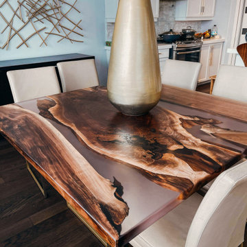 5'*5' Black walnut and clear resin Dining Table paired with gold legs.