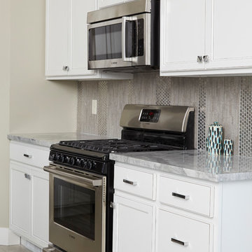 Shiny backsplash in a vertical pattern