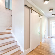 Stairs with shiplap walls