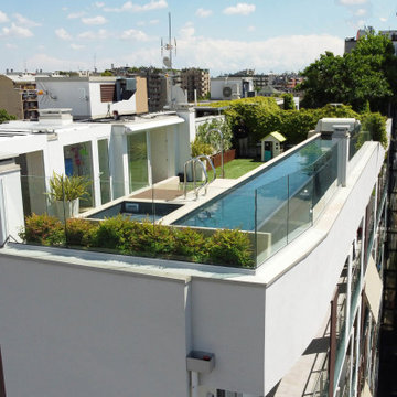 Aerial view of Milan penthouse rooftop with Roofingreen LEAF