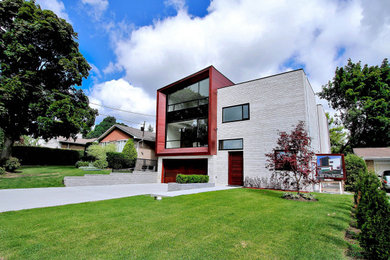 Example of an exterior home design in Toronto