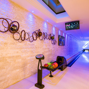 Photo of a modern basement in Buckinghamshire with marble flooring and white floors.