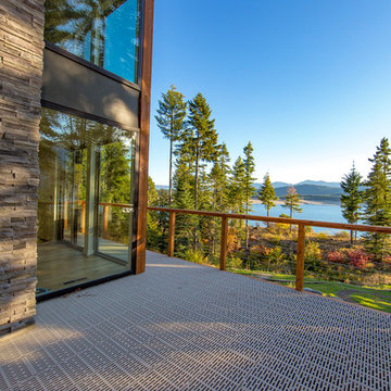 Contemporary Lake House Deck Overlooking Lake