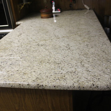Giallo Ornamental Granite Countertop/Crema Marfil Backsplash