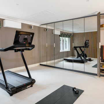 BESPOKE MIRRORED CABINETRY AND WALL PANELLING FOR A LUXURY HOME GYM