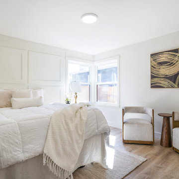 Bedroom with Picture-Frame Molding Accent Wall and Corner Windows – Seattle