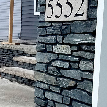 Homes using Buechel StoneBlack Frost Ledgestone is the perfect stone to complime