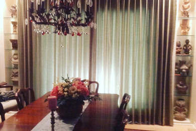 Example of a classic dining room design in Austin