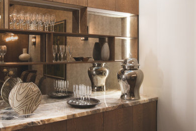 Design ideas for a contemporary home bar in London.