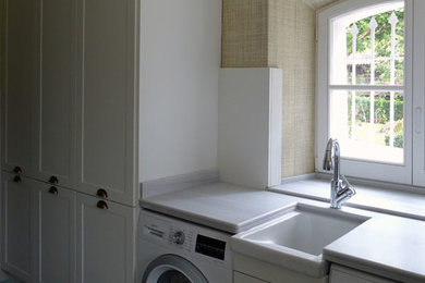 Inspiration for a transitional laundry room in Other.