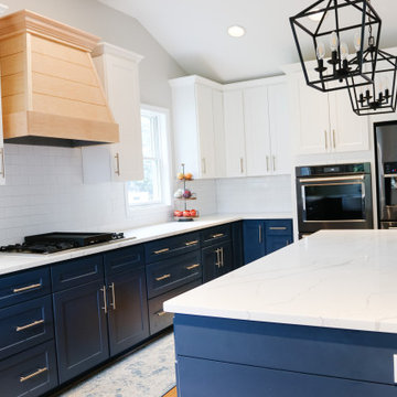 Blue Cabinetry with White Quartz and Porcelain Farm Sink in Catonsville MD