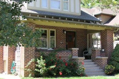 Inspiration for a mid-sized craftsman white three-story mixed siding exterior home remodel in Denver with a hip roof