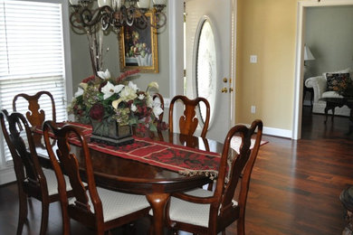 Mid-sized elegant dark wood floor kitchen/dining room combo photo in Atlanta with gray walls