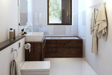 Inspiration for a mid-sized contemporary 3/4 white tile and porcelain tile ceramic tile and white floor alcove bathtub remodel in Orange County with flat-panel cabinets, dark wood cabinets, a wall-mount toilet, white walls and a vessel sink