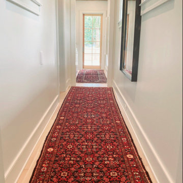 Hallway design grounded, inspired and updated by Persian runner rugs!