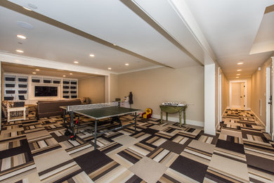 Example of a carpeted basement design in Baltimore with beige walls