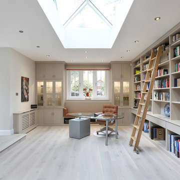 Brentwood library, sliding ladder, cabinets, seating and radiator cabinet.