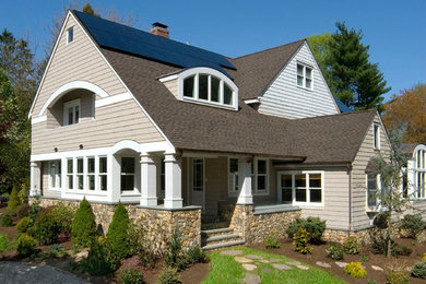 Mid-sized traditional beige three-story wood exterior home idea in New York