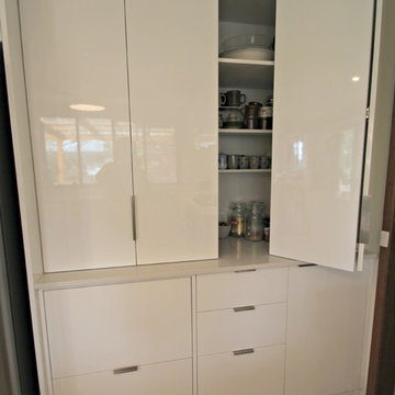 Modern White Kitchen- bi-fold pantry