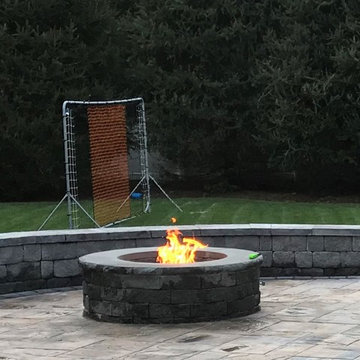 Patio with propane firepit and wall