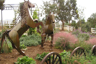 Inspiration for a mediterranean backyard landscaping in Los Angeles.