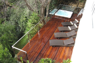 Mid-sized trendy backyard deck photo in Los Angeles with no cover