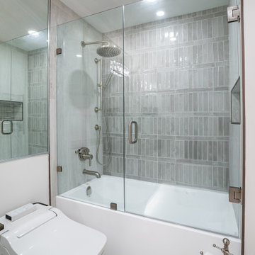 Coal Harbour Guest Bathroom – Tub-to-Shower Glass Conversion & Heated Towel Rail