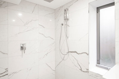 Inspiration for a master bathroom in Melbourne with an open shower, white tile, marble, white walls, marble floors, white floor and an open shower.
