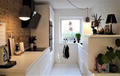 Køkken-alrum forvandlet: Rå murstensvæg og rene linjer i Horsens