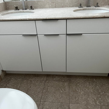 Modern Kitchen and Bathroom Remodel Done in a Snow White Color
