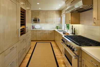 This is an example of a contemporary kitchen in Santa Barbara with panelled appliances.