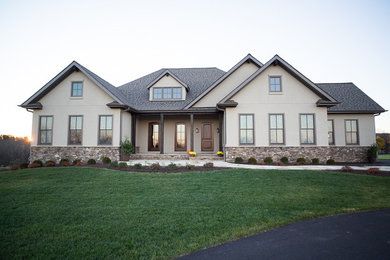 Example of a large trendy brown two-story exterior home design in DC Metro