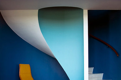 Photo of a medium sized modern spiral staircase in London.
