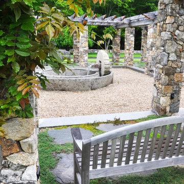 meditation garden with reclaimed olive press fountain