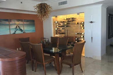 Example of a mid-sized trendy terra-cotta tile and beige floor dining room design in Miami