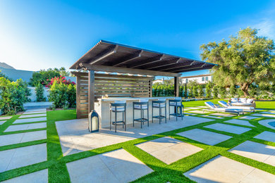 Large tuscan patio photo in Phoenix