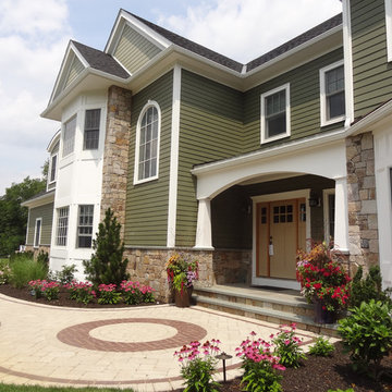 Combining Colonial Tan Natural Stone with Olive Green Siding