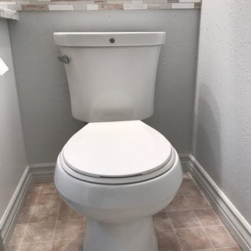 A Family Affair. Father-in-Law helps young couple remodel their guest bathroom.