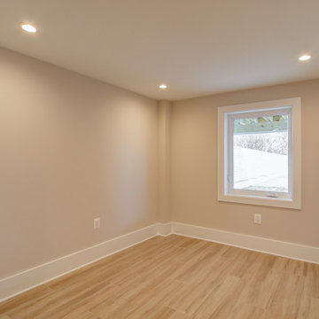 Basement remodeled with bedroom space and extra closet space in Maryland