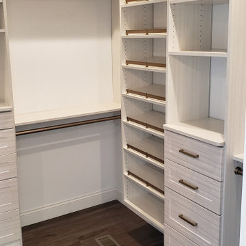 Custom master closet with full length mirror cabinet & matte gold hardware!