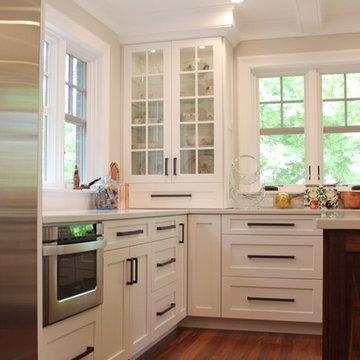 Transitional white shaker kitchen in Newton