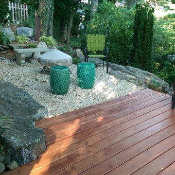 Elegant floating deck built into garden.