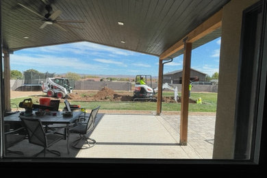 Transitional home design photo in Albuquerque