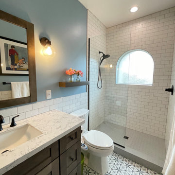 Kids bathroom remodel with intricate tile flooring