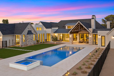 Example of a transitional home design design in Phoenix