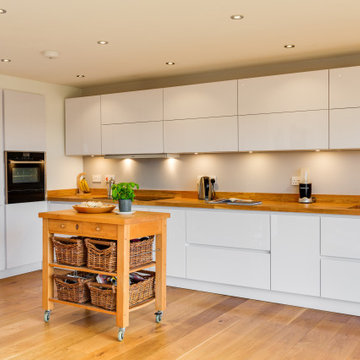 Nobilia White High Gloss Kitchen with Solid wood worktop